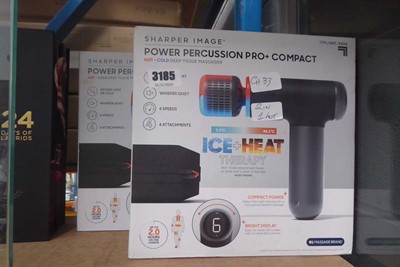 Lot 3185 - Two Sharper Image hand held massage guns