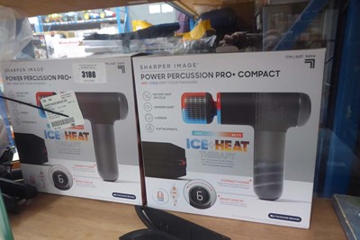 Lot 3186 - Two Sharper Image hand held massage guns