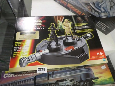Lot 2243 - Boxed Star Wars Episode 1 light saber duel game