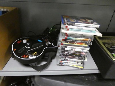 Lot 2303 - Sony Playstation 3 along with Guitar Hero...
