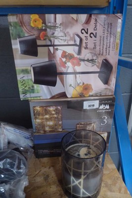 Lot 3210 - Scented candle, 2 rechargeable lamps and an...