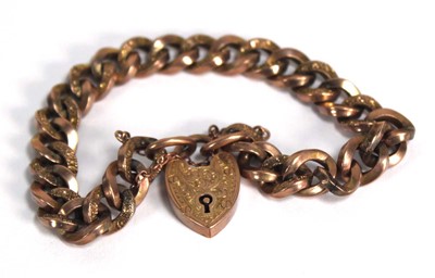 Lot 827 - A 9ct rose gold hollow engraved curblink...