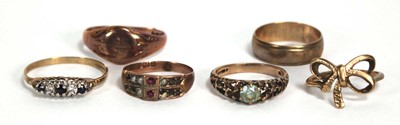 Lot 828 - Six 9ct gold rings including a rose gold...