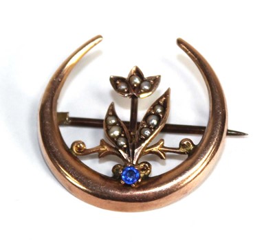 Lot 839 - A 9ct yellow gold brooch of crescent design...