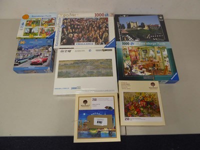 Lot 3707 - An assortment of 8 boxed puzzles, sealed and...