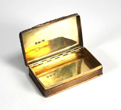 Lot 376 - A Victorian silver gilt snuff box of cushioned...