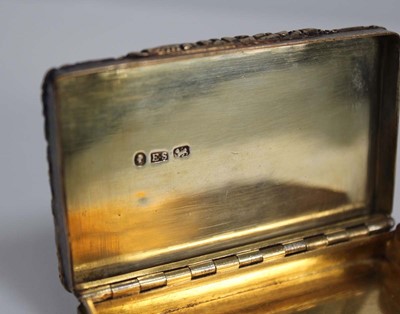 Lot 376 - A Victorian silver gilt snuff box of cushioned...