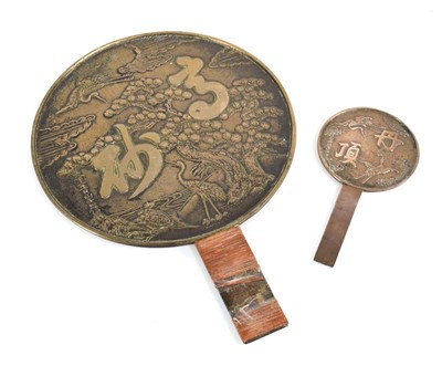 Lot 26 - A Chinese Export polished brass hand mirror...