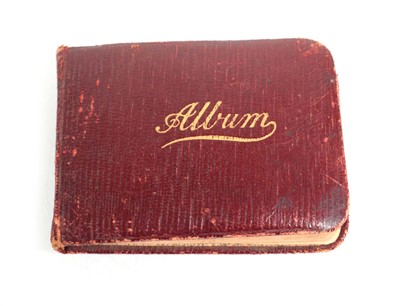 Lot 30 - A 1910/20's album including greetings,...