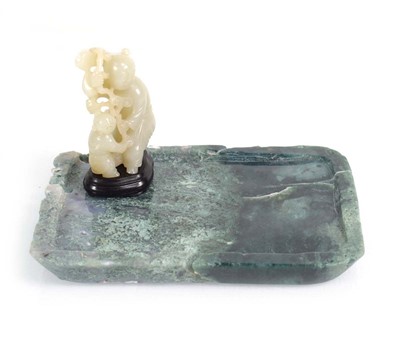 Lot 31 - A jadeite figural group modelled as a mother...