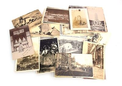 Lot 35 - A group of early 20th century postcards...