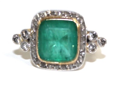 Lot 845 - An 18ct yellow gold ring set rectangular cut...