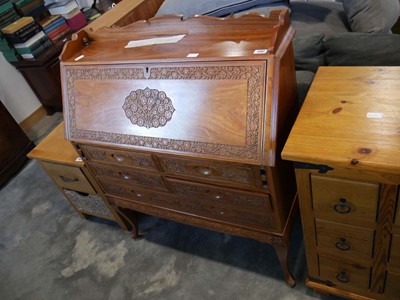 Lot 1307 - Carved fruit wood bureau with 5 lower drawers
