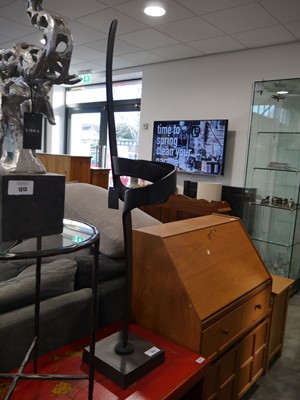 Lot 1312 - Free standing black metal abstract ornament