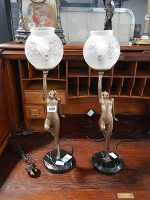 Lot 1339 - Pair of bronze finish lady lamps supporting...