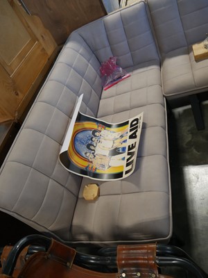 Lot 1361 - Neutral suede upholstered L-shaped bench...