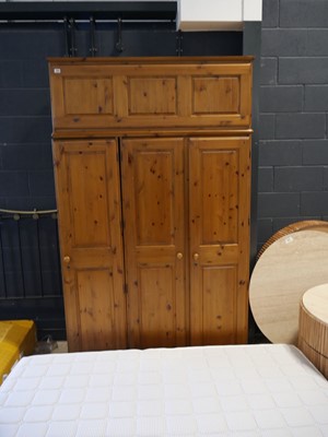 Lot 1374 - Pine triple fronted wardrobe