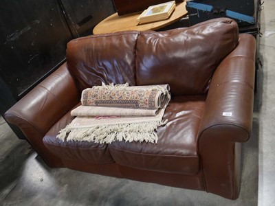 Lot 1375 - Brown leather upholstered 2 seater sofa