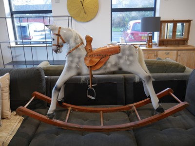 Lot 1380 - Grey finish child's rocking horse with tan...