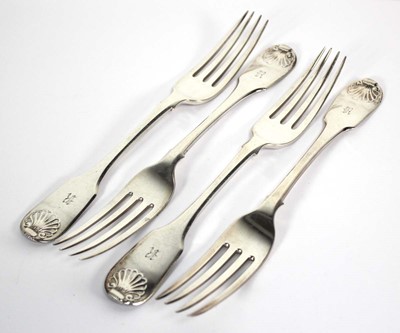 Lot 394 - A set of four George III silver fiddle and...