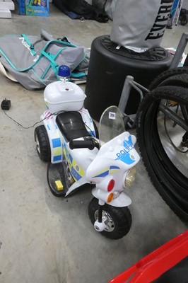 Lot 2014 - Childs battery operated ride on police motor...