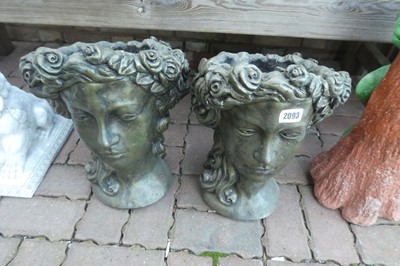 Lot 2093 - Pair of green painted concrete bust planters