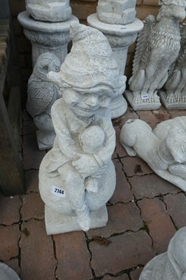 Lot 2144 - Concrete pixie on ball