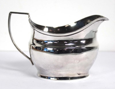 Lot 400 - A George III silver cream jug of typical form,...