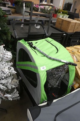 Lot 2160 - 4 wheel push along pet buggy in green and silver