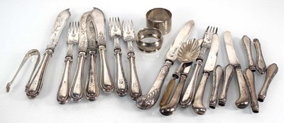 Lot 409 - A group of silver comprising two napkin rings,...