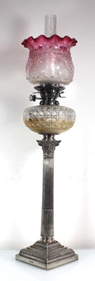 Lot 411 - An Edwardian silver oil lamp of traditional...