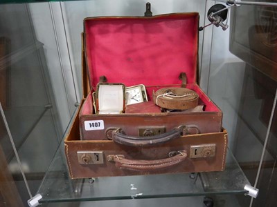 Lot 1407 - 2 small fibre leather finish cases and the...