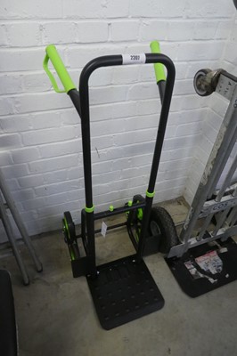 Lot 2307 - Black and green 6 wheel stair climber metal...