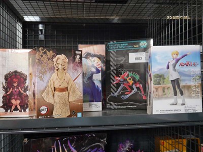 Lot 1502 - Cage containing 7 figures from Japanese media...
