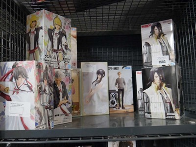 Lot 1503 - Cage containing 10 various anime figures incl....