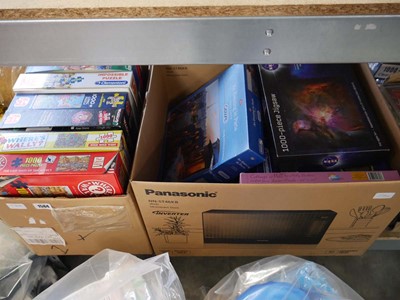 Lot 1584 - 2 boxes of jigsaw puzzles