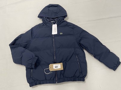 Lot 3831 - Lacoste blue puffer coat size 14 A (hanging)