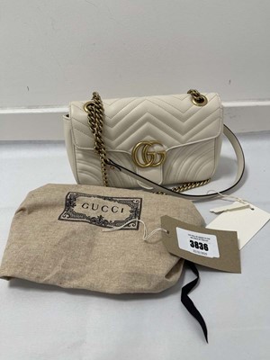 Lot 3836 - Gucci handbag in off-white with dust bag...