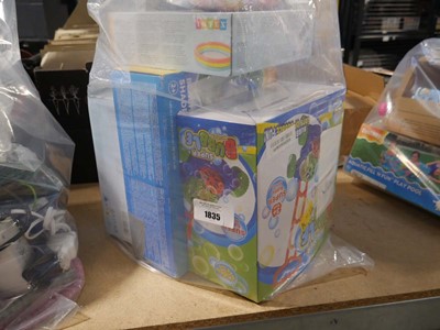 Lot 1835 - Bag containing various toys incl. wet suit...