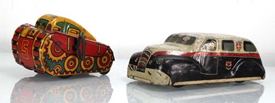 Lot 151 - A Marx Toys clockwork tank and a Joytown...