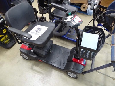 Lot 4372 - Careco. folding red disability scooter with...