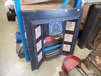 Lot 4213 - Cast iron fire surround with tiled inserts