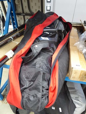 Lot 4226 - Red golf travel case with X Series golf bag...