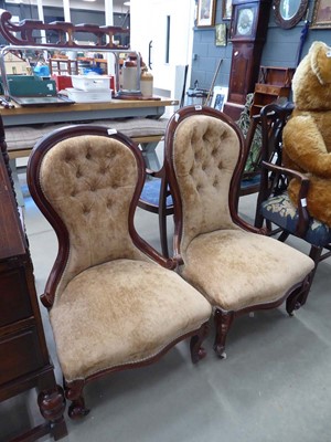 Lot 5116 - Pair of His & hers button back fireside chairs