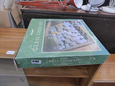 Lot 5192 - Glass chessboard with pieces