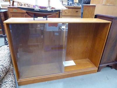 Lot 5218 - Teak bookcase with glazed sliding doors