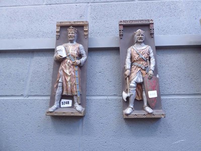 Lot 5248 - Pair of metal wall hangings depicting knights