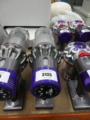 Lot 3135 - Handheld Dyson V10 vacuum with pole and...
