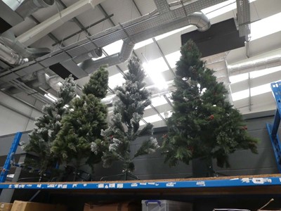 Lot 3268 - Four large Christmas trees on stands