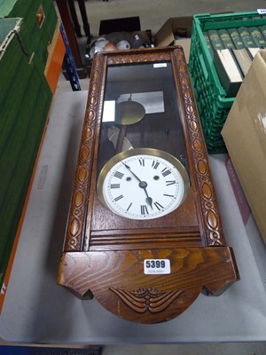 Lot 5399 - Oak wall mounted clock